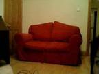 RED 2 seater sofa - Â£20 Really nice and comfortable red....